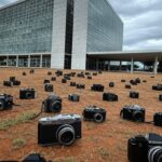 Edifício da CLDF em Brasília sob céu nublado, representando críticas por falta de transparência em concurso de fotografia.