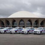 Edifício da CLDF em Brasília com viaturas da Polícia Civil, ilustrando falhas na Previdência e apoio à regulamentação.